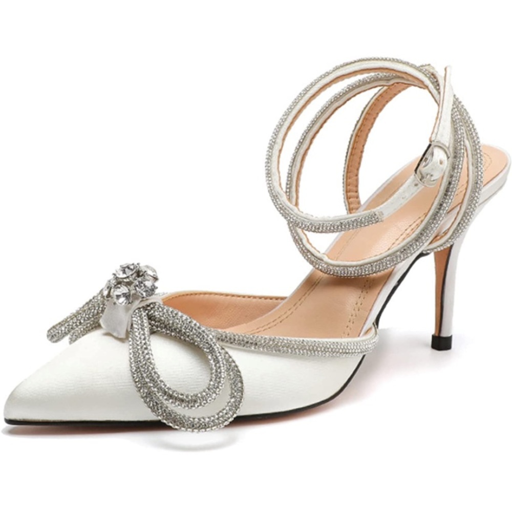Never worn jeweled bow heel!
